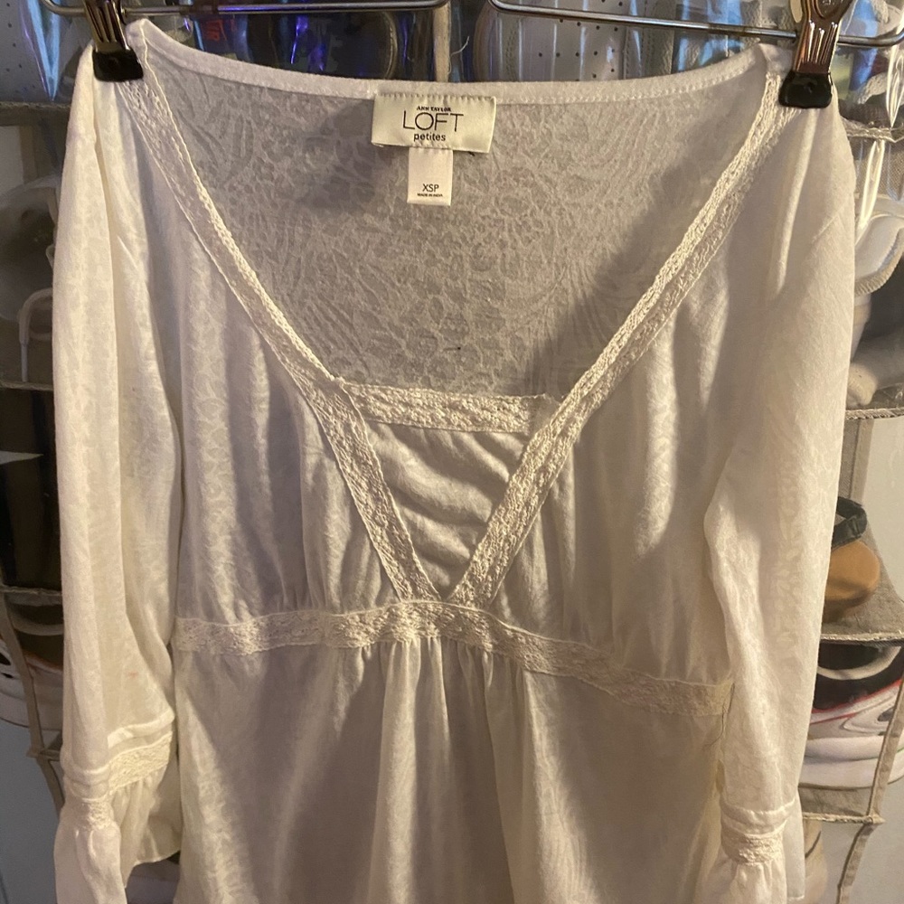 White floral and lace long sleeve shirt.